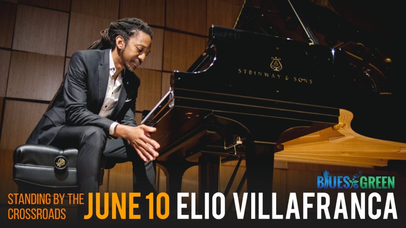Promotional image of Elio Villafranca at the piano for Standing by the Crossroads.